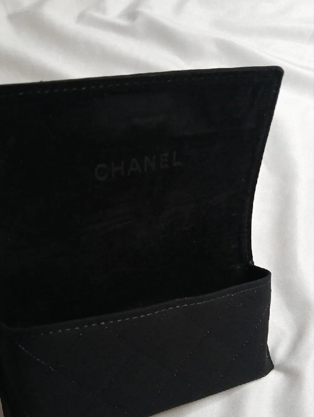 CHANEL Black Cat-Eye Sunglasses with White/Silver CC Emblem